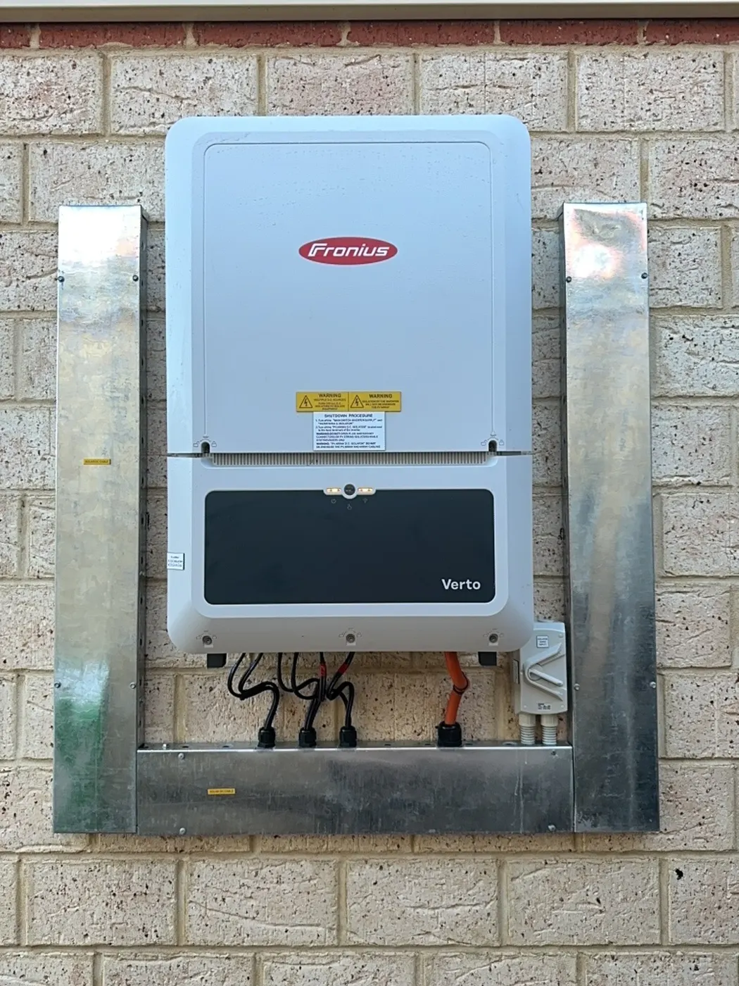 Fronius inverter mounted on a brick wall at MercyCare Kelmscott